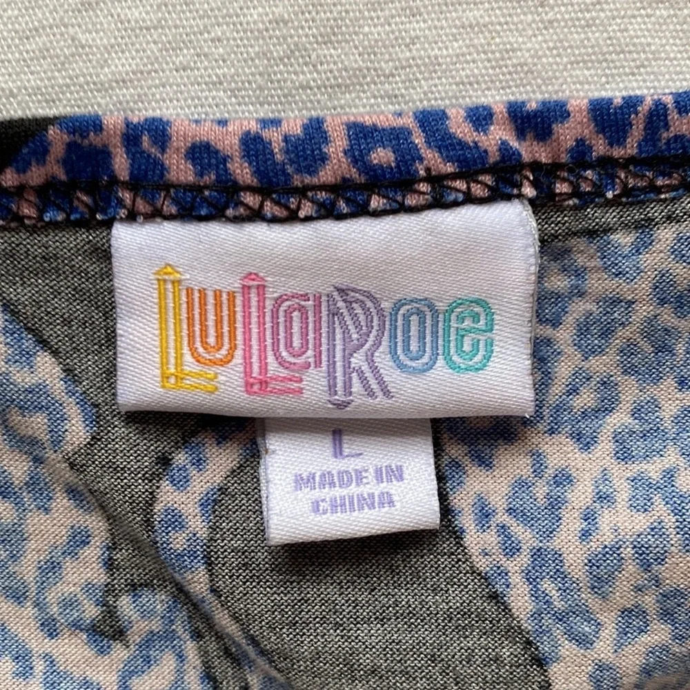 💜💜 LulaRoe Cheetah Short Sleeve Top Size L